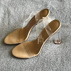 Clear nude heels. Size 9.5. Never worn